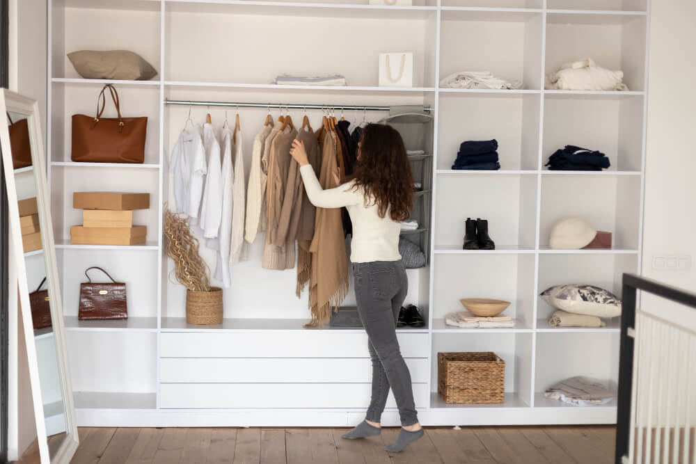 full-shot-woman-checking-wardrobe wardrobe