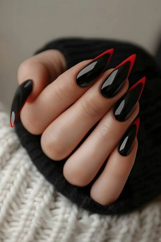 Black Halloween nails with red tips Black Halloween nails with red tips