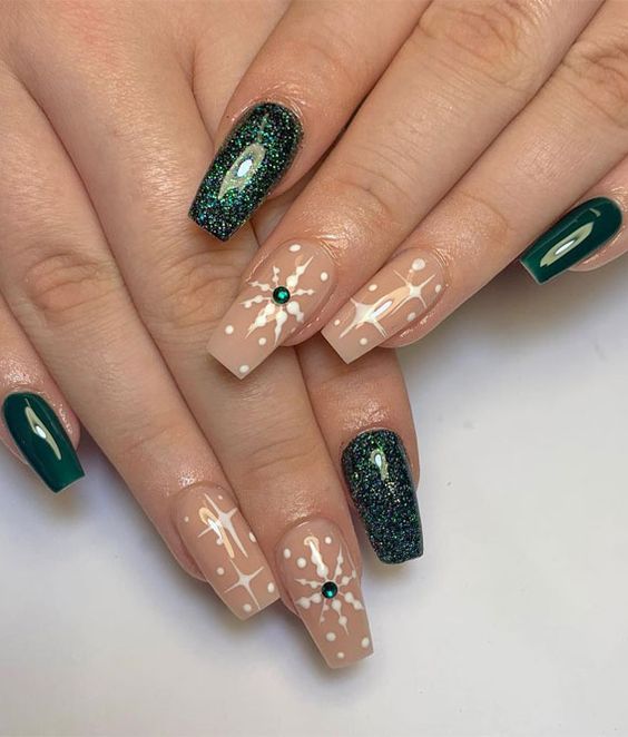 green and nude nails with snowflakes green and nude nails with snowflakes
