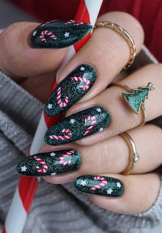 green nails with red candy cane green nails with red candy cane