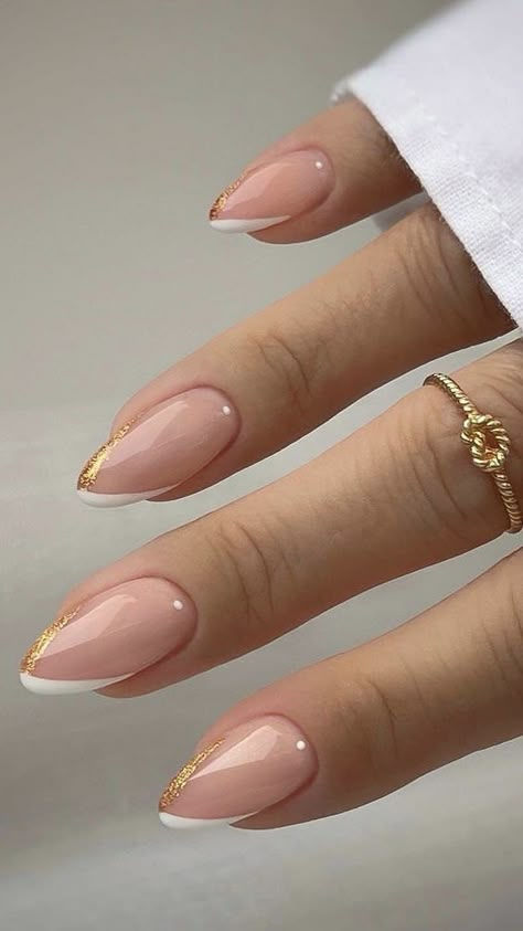 French tip nude nails with golden twist
